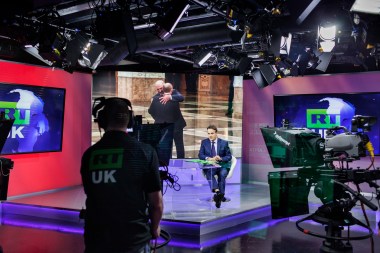 Anchor Bill Dod presents the news at RTâ€™s London studios
