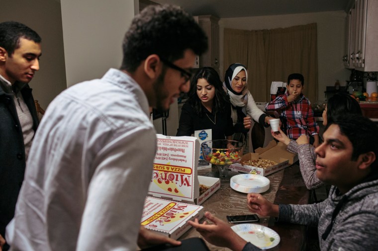 DECEMBER 19, 2015 - FREDERICKSBURG, VA - Sara Shanab, 19, center, and her brother Mohamed Shanab, 18, second from left, host a meeting with the Muslim Sutdent Assocation board members at their home in Fredericksburg, Va. The siblings decided to start a Muslim student group at their school, Germanna Community College. They have done charitable work through the club and plan to help facilitate social understanding about Islam.