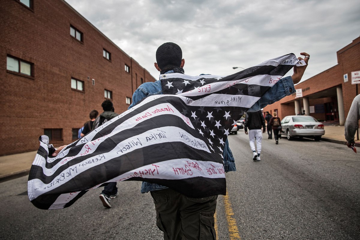 Demonstrators celebrate in Baltimore on May 1 after police officers were charged in connection with the death of Freddie Gray, who died in custody