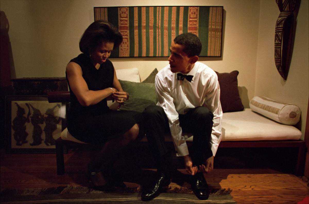 Barack Obama and Michelle Obama get ready to give the keynote address at the Chicago Economic Club at their home in Chicago on Dec. 8, 2004.