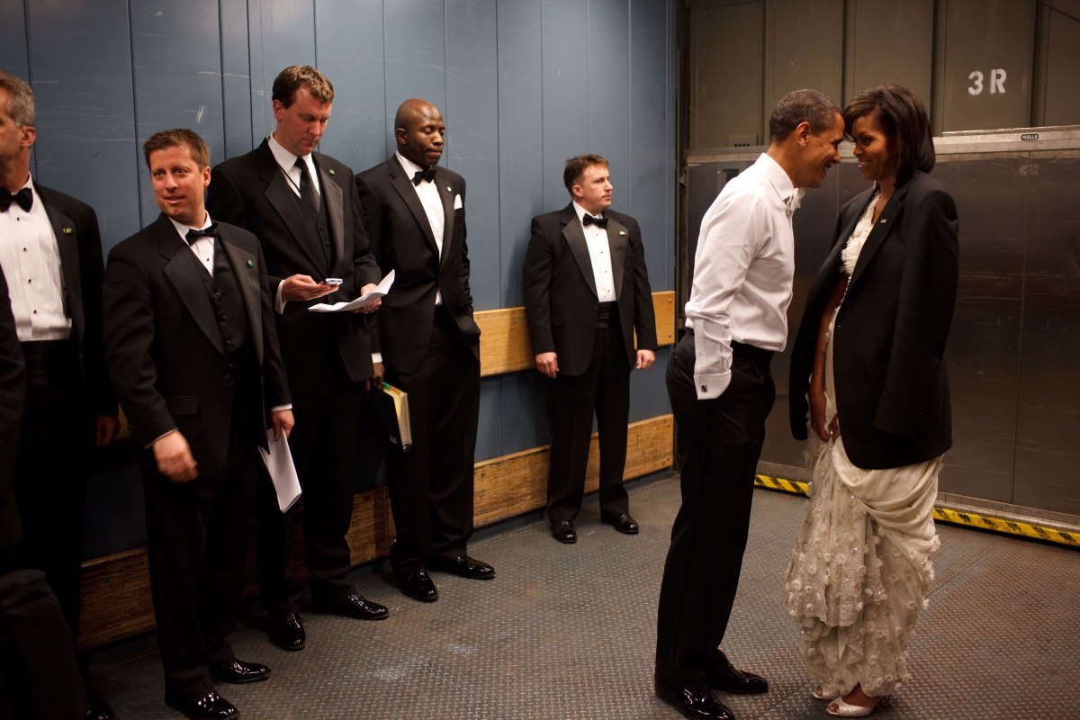 Barack Obama and Michelle Obama share a private moment in a freight elevator at an Inaugural Ball in Washington, D.C., Jan. 20, 2009.