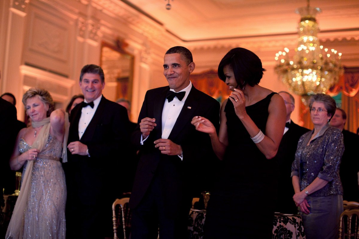 Barack Obama and Michelle Obama dance together during the Governors Ball in the East Room of the White House, Feb. 21, 2010.