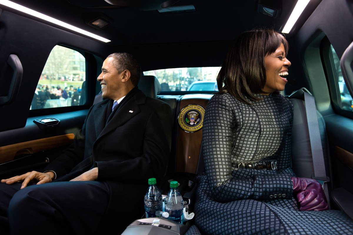 Barack Obama and Michelle Obama ride in the inaugural parade in Washington, D.C., Jan. 21, 2013.