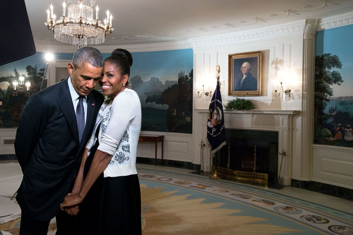 The First Lady snuggled against the President during a video taping for the 2015 World Expo in the Diplomatic Reception Room of the White House, March 27, 2015.