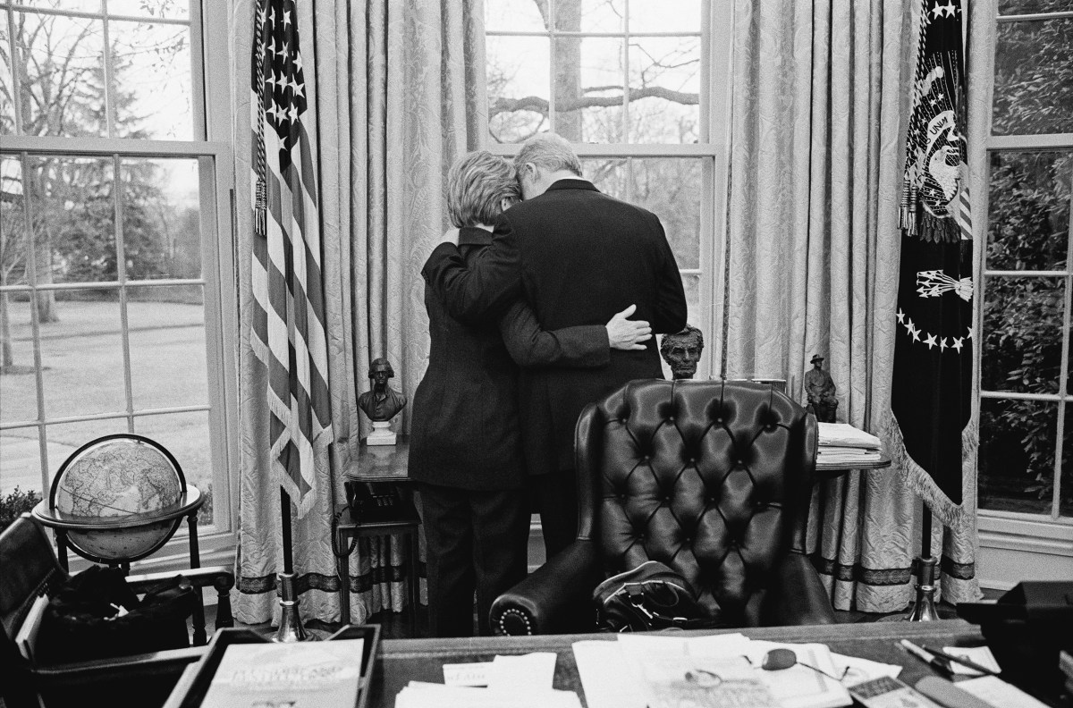 Bill Clinton and Hillary Clinton Share a private moment, one of their last in the Oval Office on Jan. 11, 2001.