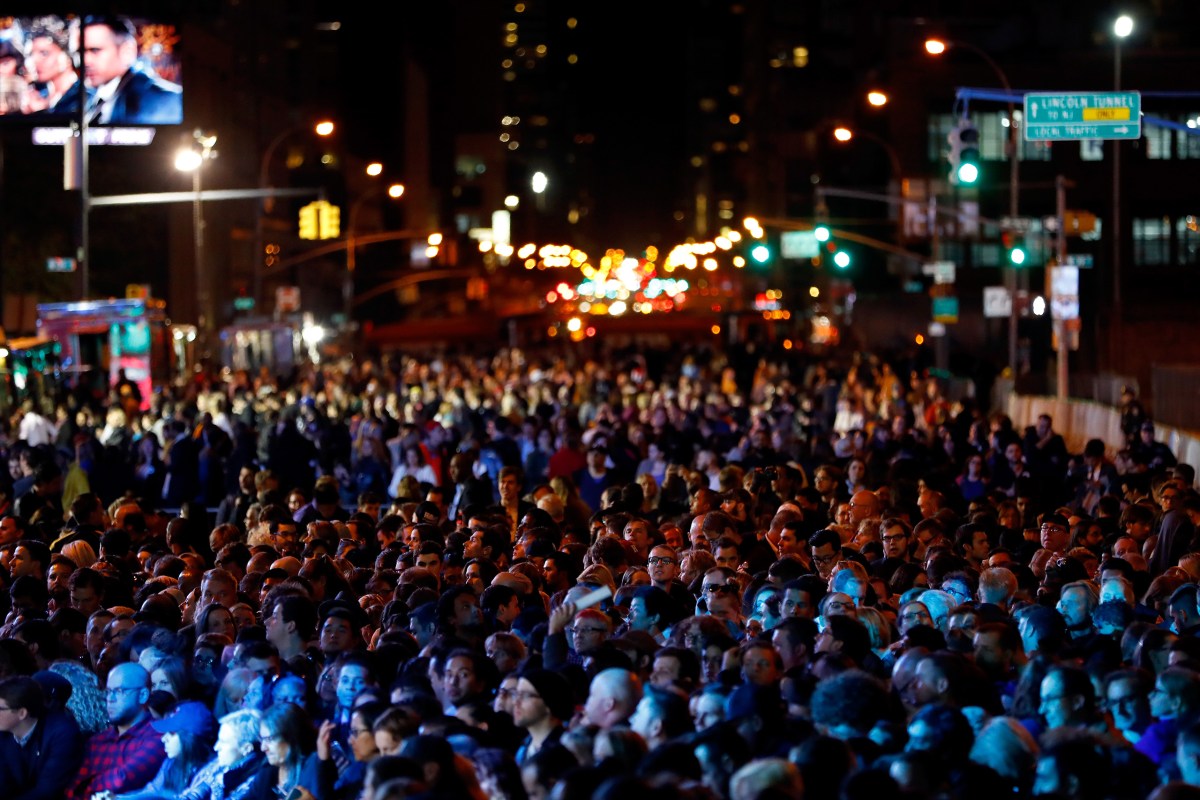 People wait for results outside the Jacob K. Javits Convention Center where Hillary Clinton is holding her election night event, on Nov. 8, 2016 in New York City.