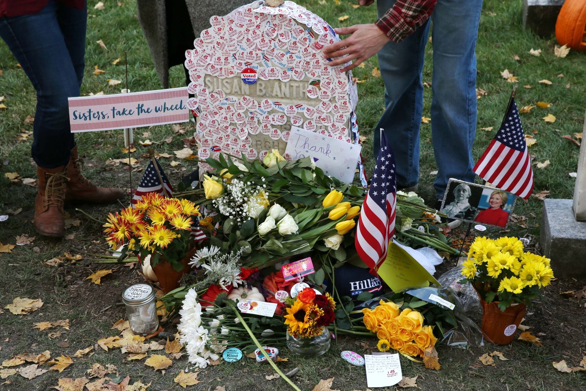 Voters lined up on election day to place "I voted" stickers on the grave of Susan B. Anthony at Mt. Hope Cemetery, on Nov. 8, 2016 in Rochester, NY.