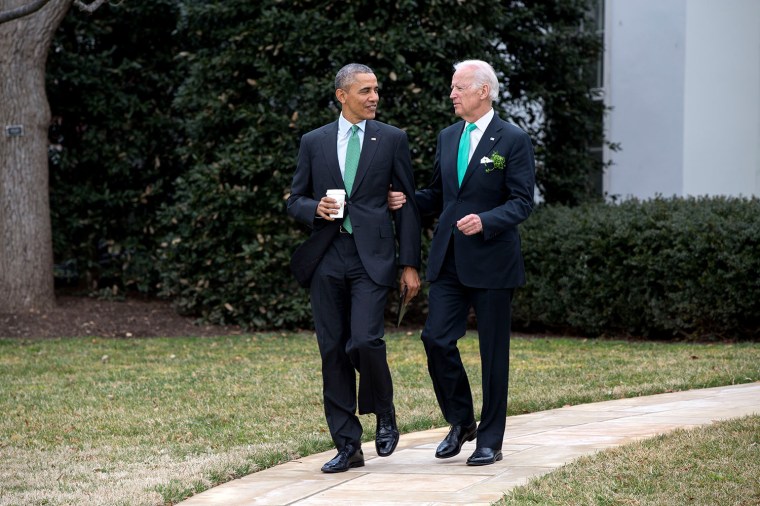 President Barack Obama and Vice President Joe Biden walk to the motorcade on the South Lawn of the White House for departure en route to the U.S. Capitol in Washington, D.C. for a St. Patrick's Day lunch, March 17, 2015. (Official White House Photo by Pete Souza)This official White House photograph is being made available only for publication by news organizations and/or for personal use printing by the subject(s) of the photograph. The photograph may not be manipulated in any way and may not be used in commercial or political materials, advertisements, emails, products, promotions that in any way suggests approval or endorsement of the President, the First Family, or the White House.