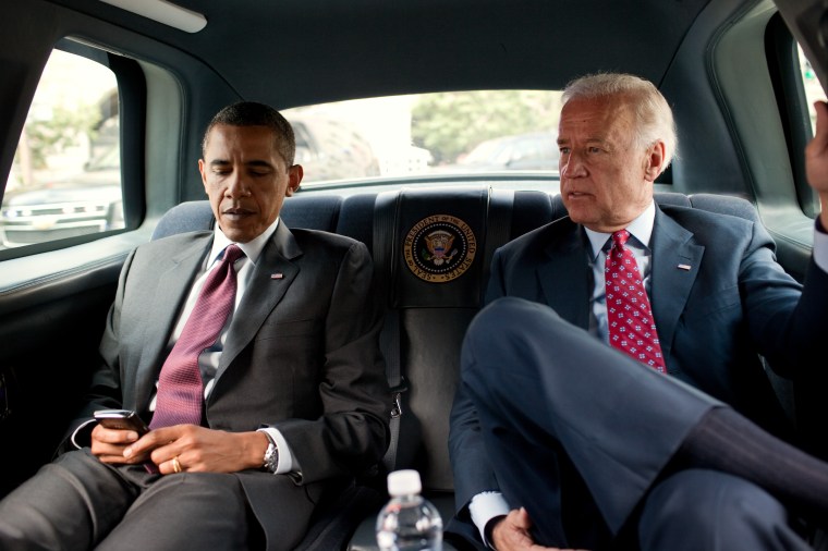 President Barack Obama and Vice President Joe Biden ride in the motorcade from the White House to the Ronald Reagan Building in Washington, D.C., July 21, 2010, to sign the Dodd-Frank Wall Street Reform and Consumer Protection Act. (Official White House Photo by Pete Souza)This official White House photograph is being made available only for publication by news organizations and/or for personal use printing by the subject(s) of the photograph. The photograph may not be manipulated in any way and may not be used in commercial or political materials, advertisements, emails, products, promotions that in any way suggests approval or endorsement of the President, the First Family, or the White House.