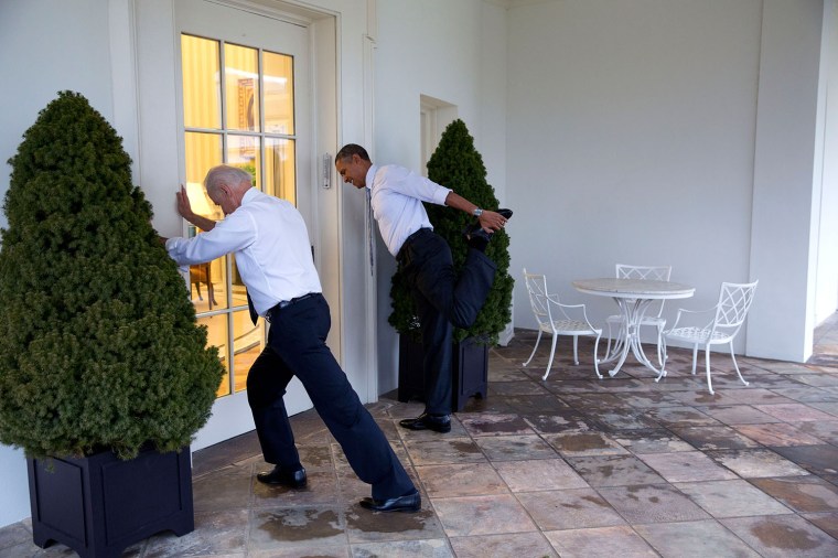 President Barack Obama and Vice President Joe Biden participate in a Let's Move video taping on the Colonnade of the White House, Feb. 21, 2014. (Official White House Photo by Pete Souza)This official White House photograph is being made available only for publication by news organizations and/or for personal use printing by the subject(s) of the photograph. The photograph may not be manipulated in any way and may not be used in commercial or political materials, advertisements, emails, products, promotions that in any way suggests approval or endorsement of the President, the First Family, or the White House.