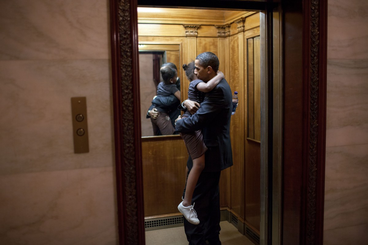 In this official White House photograph, President Barack Obama holds SashaÃÂ after finding her in an elevator after an eventÃÂready to head upstairs to the private residence. He decided to ride upstairs with her before returning to the Oval Office, May 19, 2009.