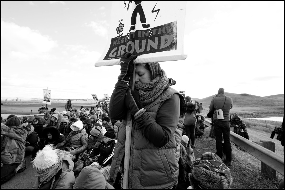 Protesters block a road during a prayer ceremony in Standing Rock, North Dakota, on Nov. 18, 2016. Two days later violence erupted between the protesters and police force, on Nov. 20, 2016.