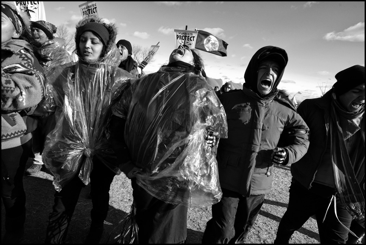 Demonstrators lock arms as they protest against the 1,200-mile access pipeline in Standing Rock, North Dakota, on Nov. 18, 2016.