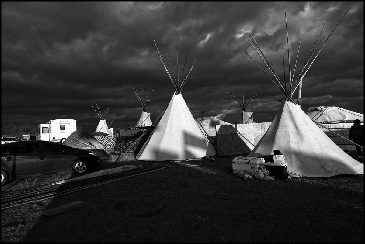 Teepee tents are set up in preparation for winter at Oceti Sakowin Camp in Standing Rock, North Dakota on November 18th, 2016. The most dedicated protesters say they will remain through winter, even though the average low temperature in North Dakota reaches nearly 0 F (-17.8 C) in those months.