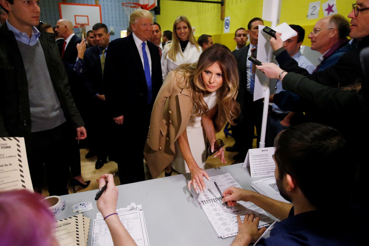 Melania Trump signs her name before she votes at PS 59 in New York, on Nov. 8, 2016.