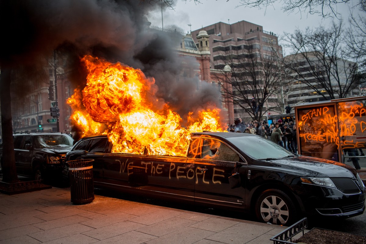 In the afternoon on Jan. 20 after President Trump was inaugurated, one group of protesters near 13th and K in Washington, D.C., took their rage to the streets. A few cars were smashed and this limo was set on fire before police used stun grenades and pepper spray to disperse the crowd and put out the flames once again.