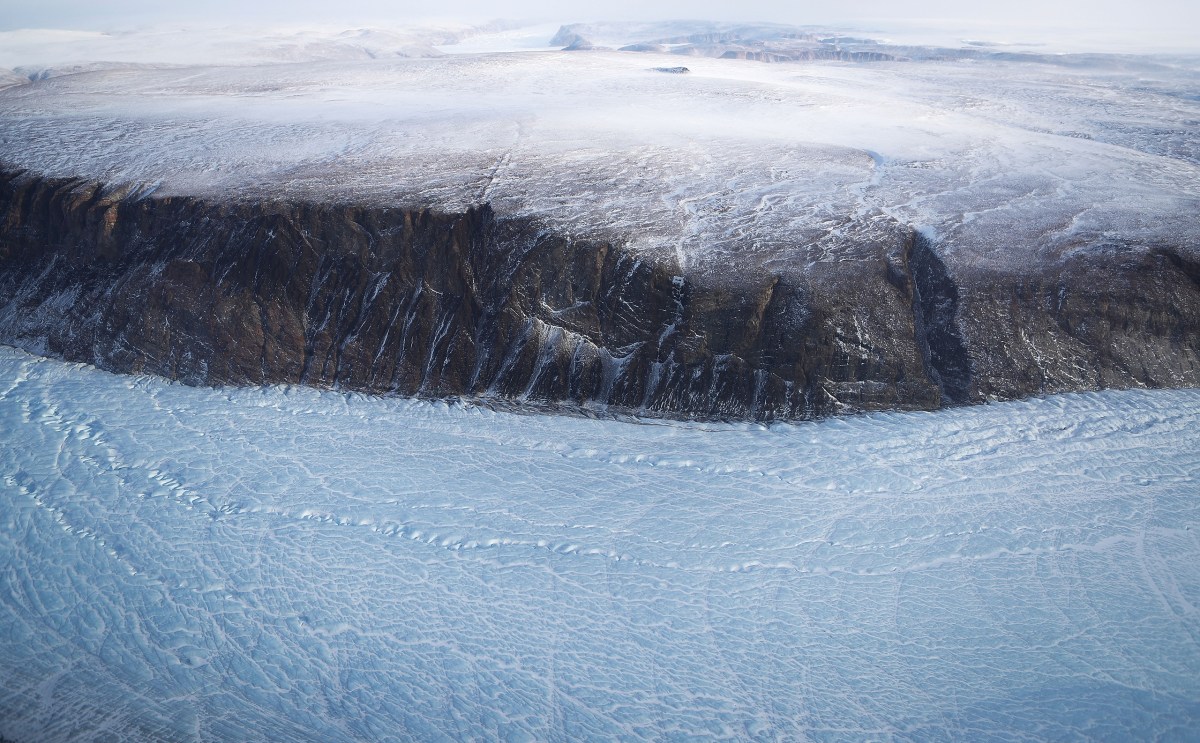 Greenland's ice sheet is retreating due to warming temperatures.