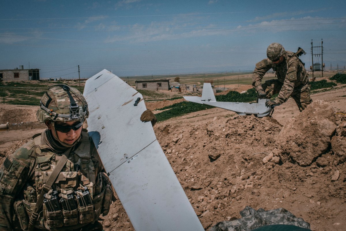 U.S. soldiers recover a Puma drone after a surveillance mission over western Mosul on April 6.