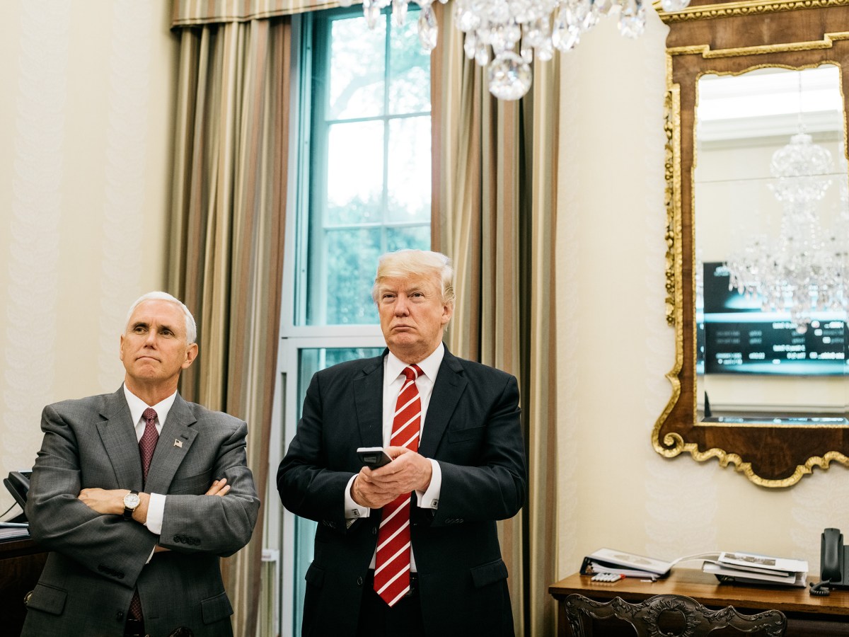 Trump, with Pence, watches a replay of Senate hearings from his private dining room near the Oval Office on May 8. Benjamin Rasmussen for TIME