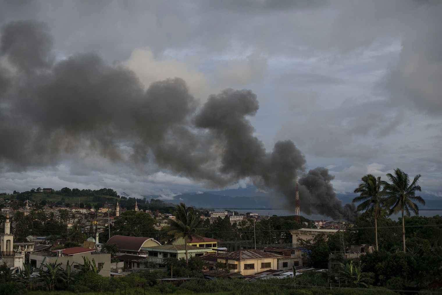 Smoke rises after aerial bombings by Philippine Air Force planes on Islamist militant positions in Marawi on June 9, 2017. Noel Celis—AFP/Getty Images