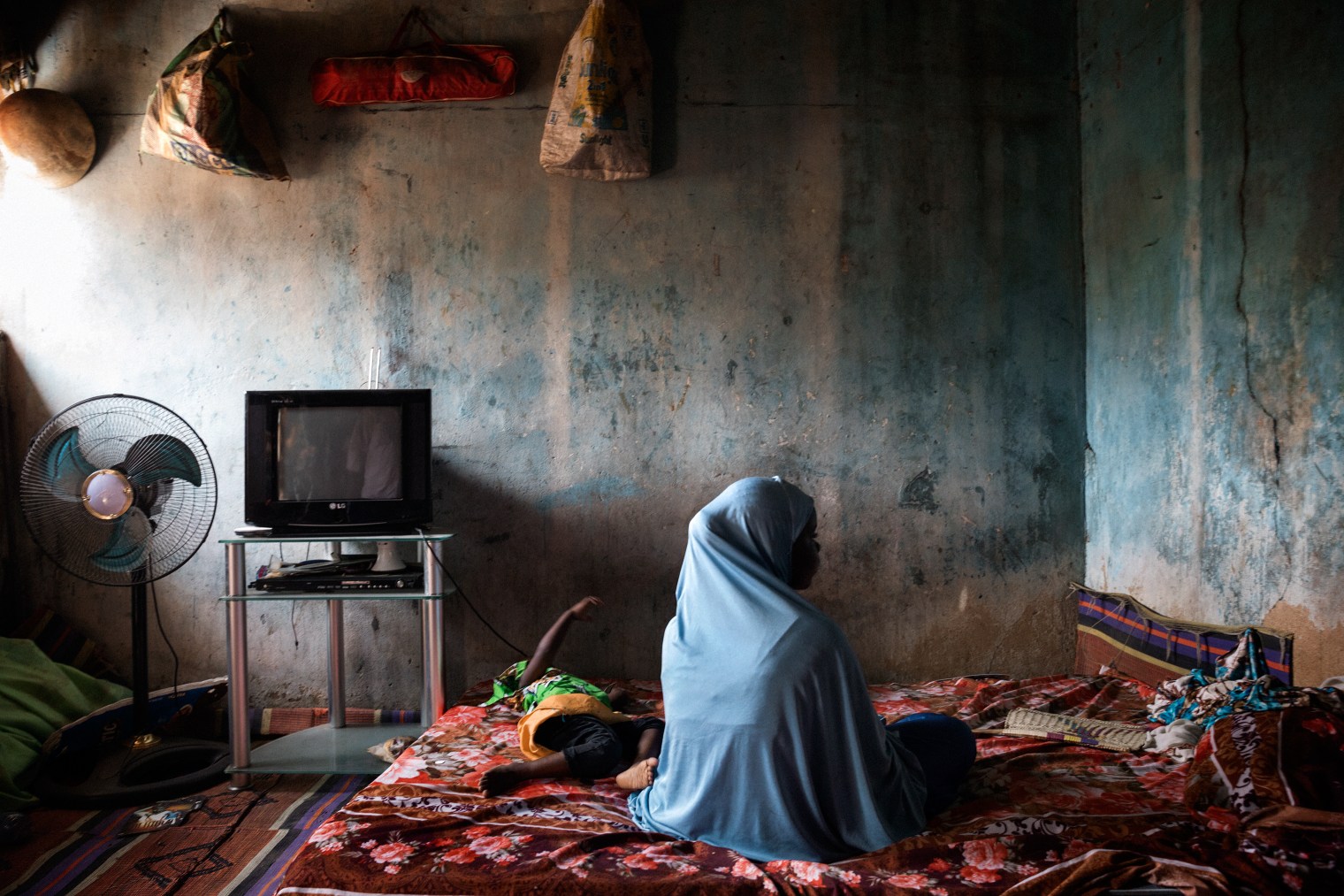 Dada, 14, with her daughter Hussainia, 18 months, was kidnapped and raped at age 12 while a captive of Boko Haram.