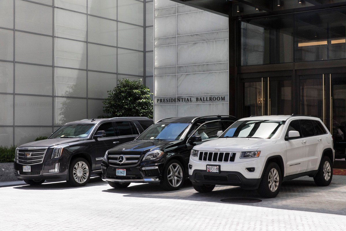 <span class="credit">Christopher Morris—VII for TIME</span><span class="caption">Luxury SUV's line up outside of the presidential ballroom at the Trump International Hotel.</span>