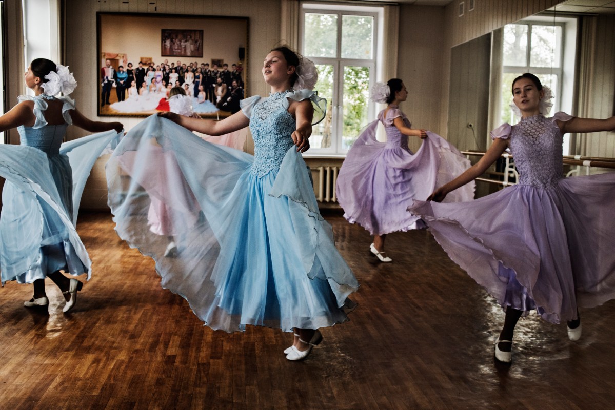 The school also teaches traditional subjects. Here, they attend an annual Winter Ball where they can meet boys from the Moscow Cossack Cadet Corps, another military-style academy that has become popular in the Putin years, Sept. 2016.