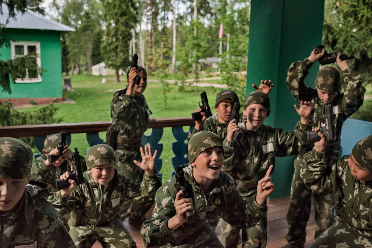 At the children’s military summer camp known as Razvedbat, meaning “Reconnaissance Battalion,” Russian boys and girls prepare for military service, learn to love their country and to fight for it, using a rich variety of weapons, in Klin, a suburb of Moscow, Aug. 2016.