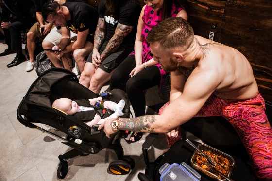 UFC lightweight champion Conor McGregor takes a break with his infant so.n