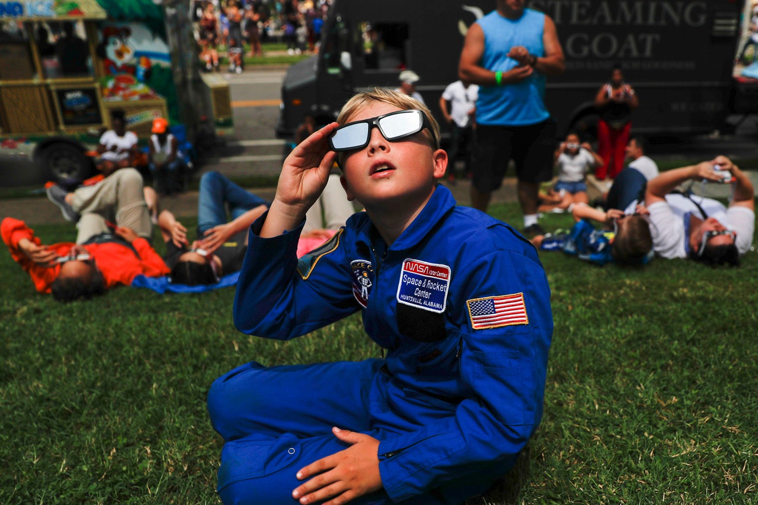 Tyler Hanson, of Fort Rucker, Ala., watches the sun moments before the total eclipse on Aug. 21, 2017, in Nashville, Tenn. 