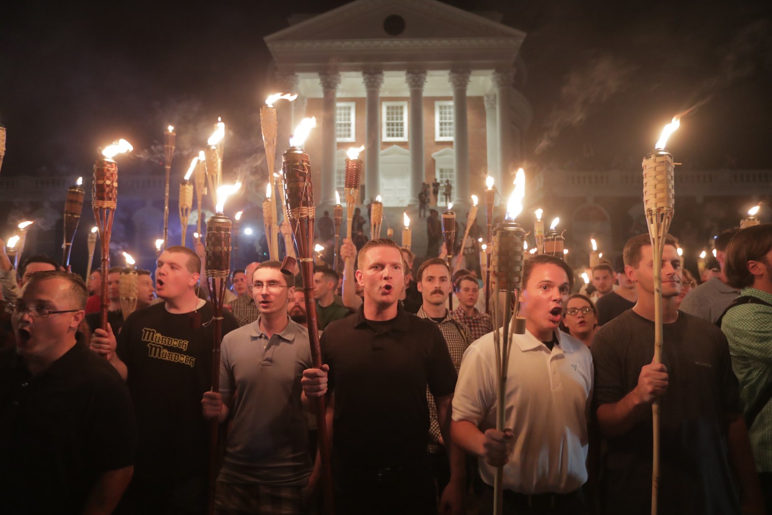 hite nationalists lead a torch march through the grounds of the University of Virginia campus in Charlottesville, Va., on Aug. 11, 2017.