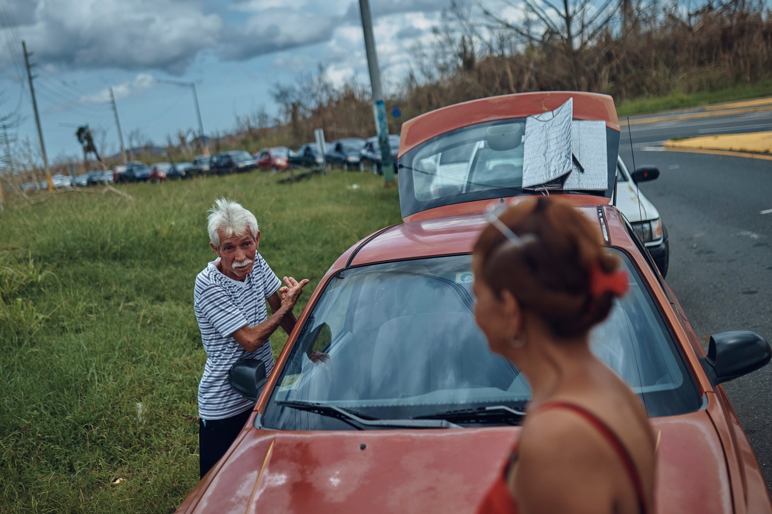People wait in line to buy gasoline in Morovis, Puerto Rico, on Oct. 1, 2017.