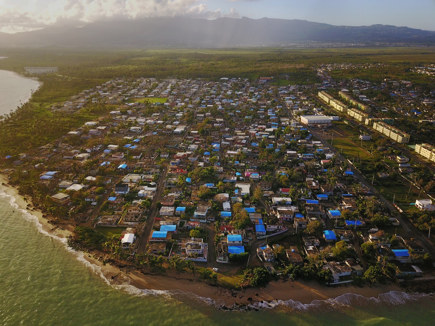 The coastal city of Loiza was hard hit by Hurricane Maria with a long-lasting power outage and water and food shortages. 